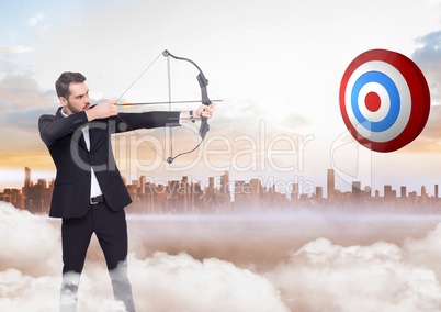 Businessman holding bow and arrow while aiming at the target board