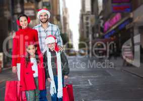 Happy family standing together on road