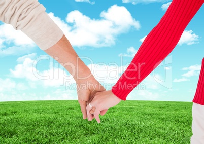 Close-up of newly couple holding hands