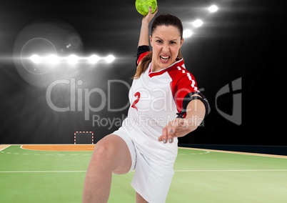 Aggressive player playing handball in stadium