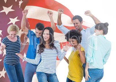 Colleagues dancing against american flag in background