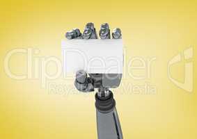 Robot hand holding a blank card against yellow background