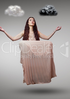 Woman meditating in mid-air and cloud computing in background