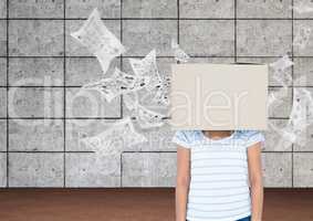 Businesswoman with her face covered with cardboard box standing against data sheets in background