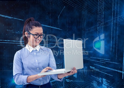 Businesswoman using laptop with binary codes in background