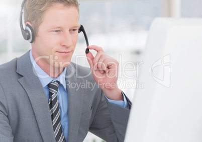 Customer service executive working at desk