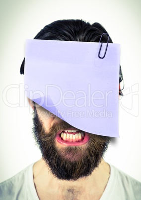 Man with a sticky note attached to his face
