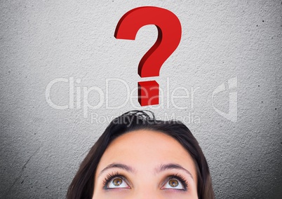 Woman looking at question mark graphic above her head