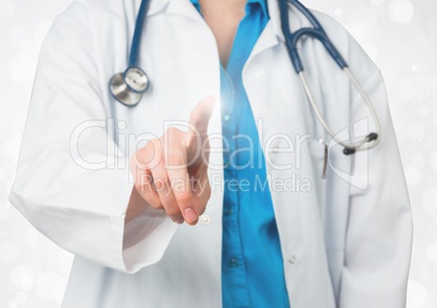 Doctor with stethoscope using digital screen