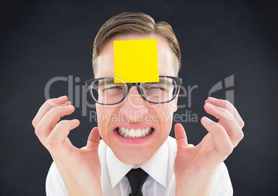 Frustrated man with blank sticky note on forehead