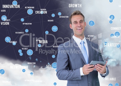 Businessman holding digital tablet with connecting icons