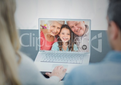 Couple having video chat on laptop