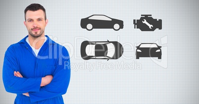 Mechanic standing with arms crossed against car icons in background