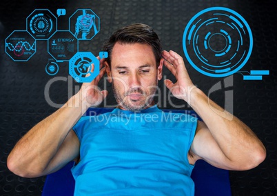 Man exercising on mat in gym