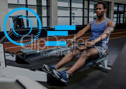 Fit man performing seated row exercise in gym with fitness interface