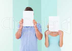 Couple covering their face with blank paper