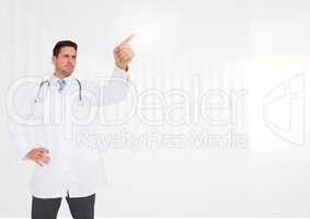 Doctor with hand on hip using digital screen