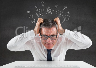 Businessman sitting on his desk with hands on his head against thinking icons in background