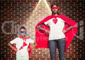 Portrait of woman and girl in red cape