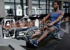 Fit man performing seated row exercise in gym against fitness interface in background