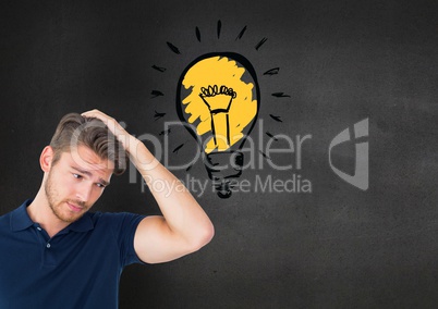 Confused man standing next to glowing light bulb icon