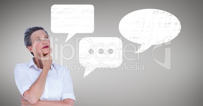 Woman with blank speech bubble against grey background