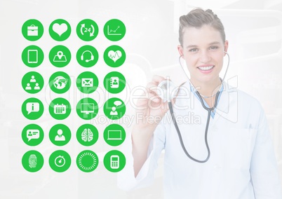 Female doctor working with stethoscope and medical icons on interface screen