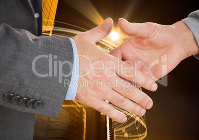Close-up of businessman and woman shaking hands