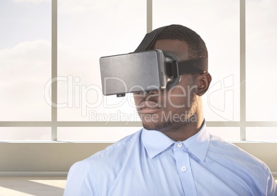 Businessman using virtual reality headset