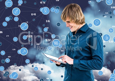 Businessman using digital tablet against cloud computing concept in sky