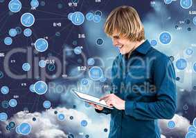 Businessman using digital tablet against cloud computing concept in sky