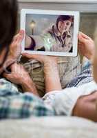 Couple having video chat on digital tablet