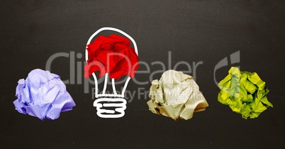 Crumpled papers with light bulb shape on black background