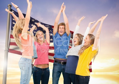 Group of people cheering against American flag