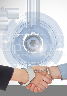 Business professionals shaking hands with handcuff against technology background