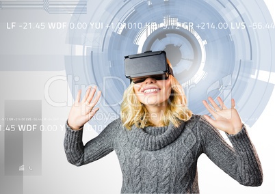 Woman using virtual reality headset against digitally generated background