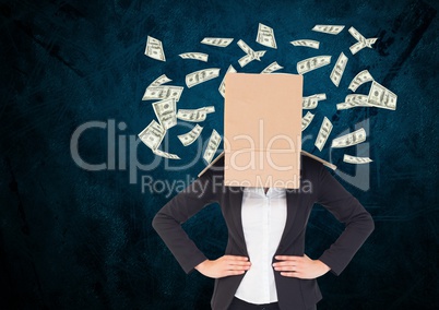 Businesswoman with her face cover with cardboard box standing against dollars flying in background