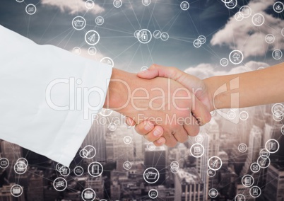 Close-up of businessman and woman shaking hands with each other