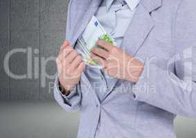 Digital composite image of a businessman keeping euro currency notes in inner pocket