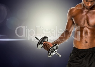 Fit man lifting dumbbell standing against digitally generated background
