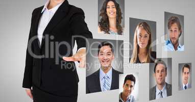 Businesswoman touching profile pictures against grey background