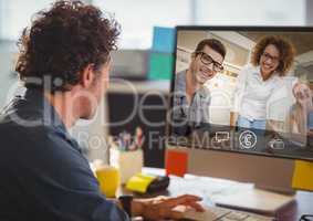 Man having video call with colleagues on computer