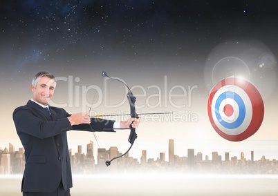 Businessman aiming at target with bow and arrow