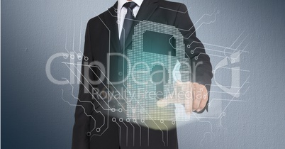 Mid-section of businessman touching lock on digital screen against grey background