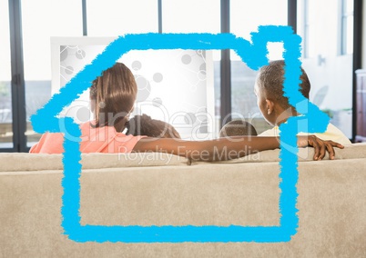 Family sitting on sofa at home against home outline in background
