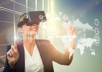 Woman using virtual reality headset with digitally generated icons