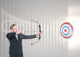 Businessman aiming at target with bow and arrow