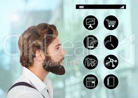 Businessman looking at icons