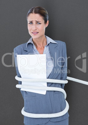 Businesswoman tied up in rope