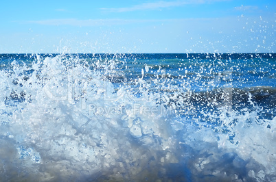 Powerful waves of the sea foam